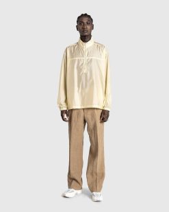 Auralee Demi-Zip En Nylon Leger P/O Jaune Clair | Tricots